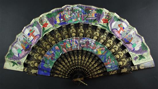 A Chinese applique work painted leaf and gilt decorated black lacquer fan, 19th century, 31cm